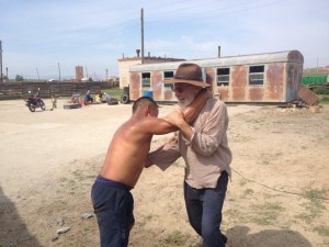 Alan challenging Mongolian wrestler   