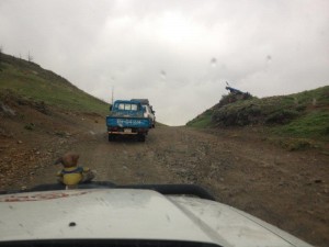 Towing small truck over slippery hill 2     